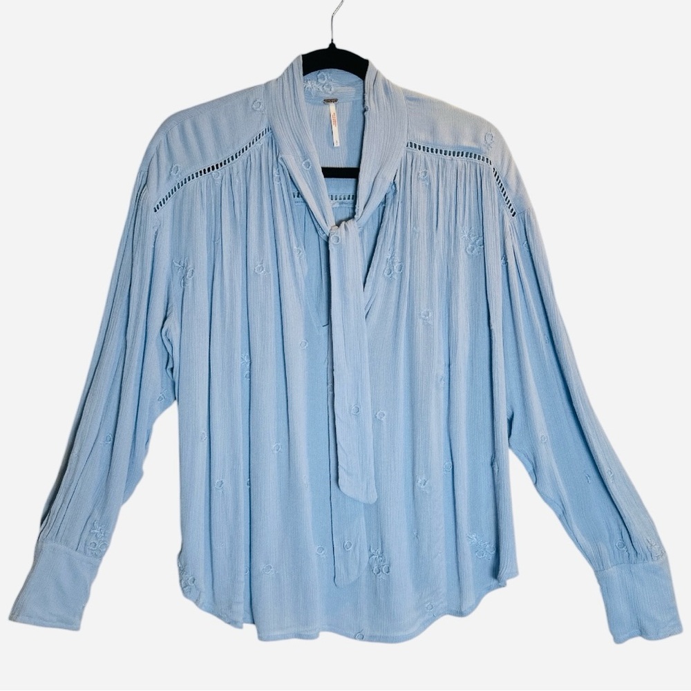 Free People Blue Flowing Blouse with V-Neck and Long Sleeves
